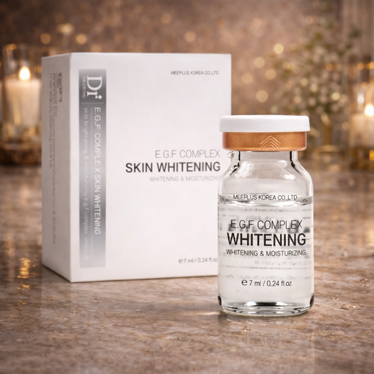 Dr. Drawing EGF Complex Whitening Ampoule with packaging on a wooden surface.