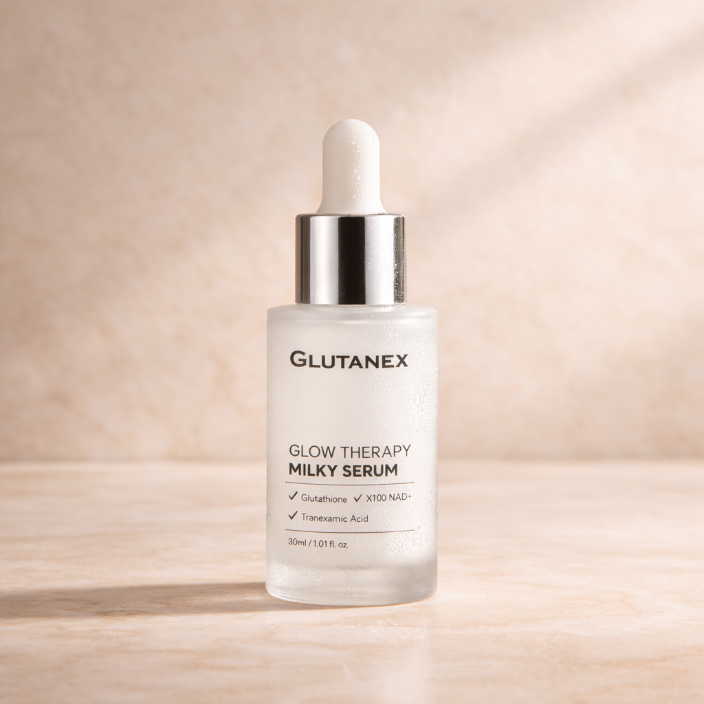 Glutanex Glow Therapy Milky Serum bottle on a beige background