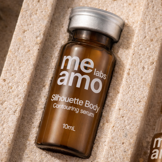 BroMeamo Silhouette Body Serum bottle on a beige stone surface